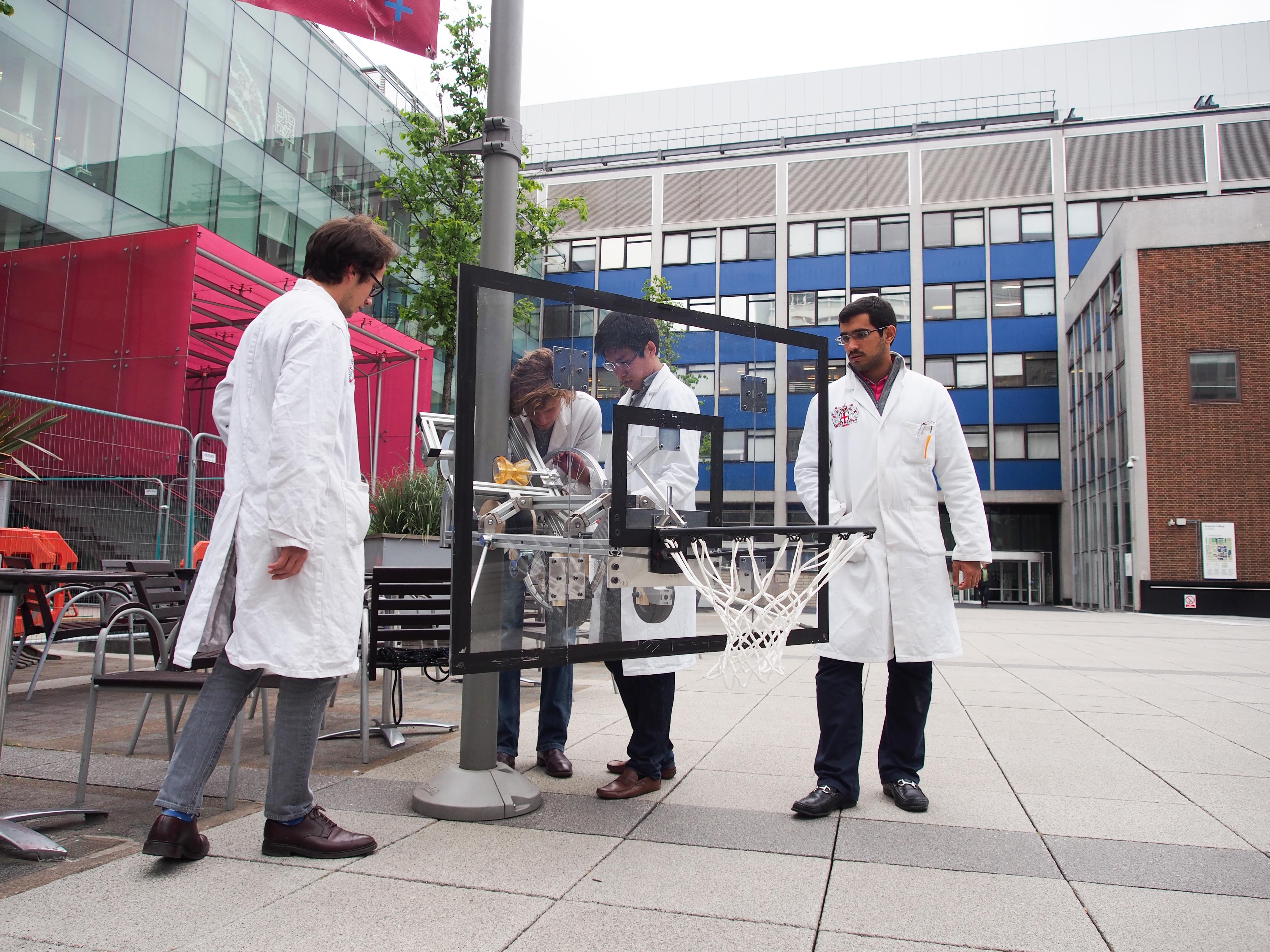 Photograph of Koala Hoop mounted and deployed onto a street pole, ready to be lifted up to the regulation height.